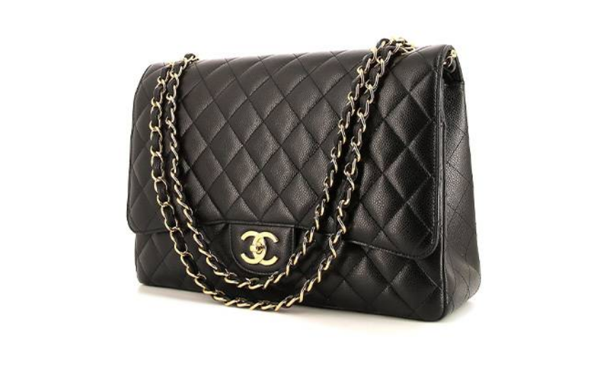 Chanel Timeless Maxi Jumbo handbag in black quilted grained leather